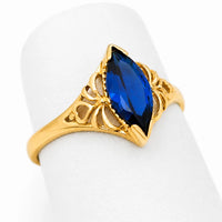Piedra azul oscuro: Anillo solitario marquesa de oro para mujer con piedra de circonia azul oscuro de 11 x 5.5 mm.