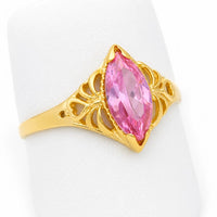 Anillo solitario marquesa de oro para mujer con piedra de circonia rosada y detalles laterales calados.