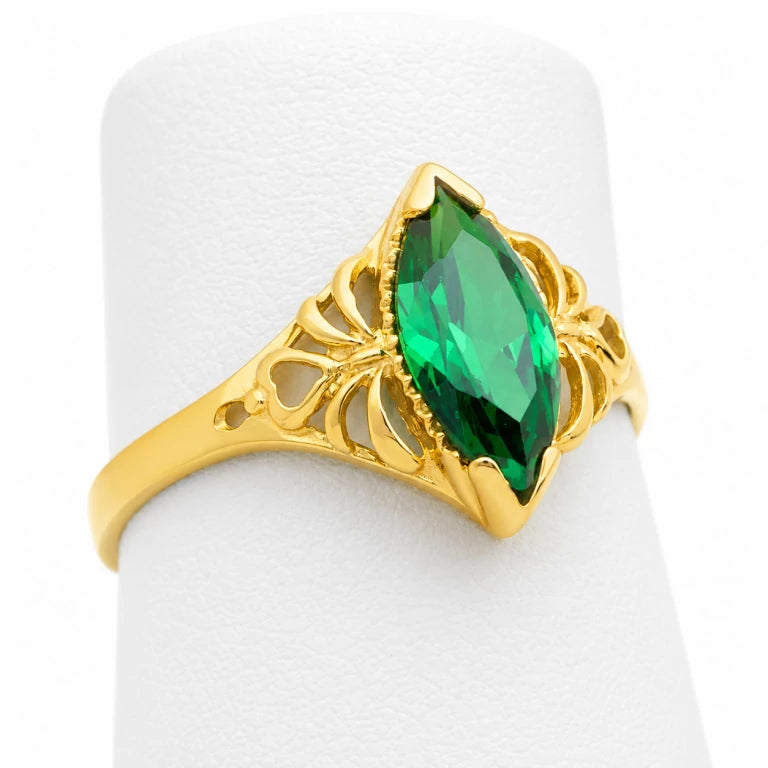 Anillo marquesa solitario de oro para mujer con piedra de circonia verde y elegante diseño calado.