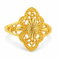 Vista frontal de anillo de oro estilo antiguo con bolitas, centro en forma de almendra y detalles calados.