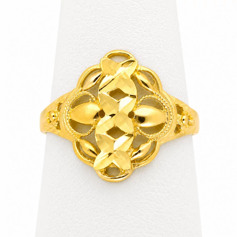 Sortija de oro amarillo de 14k para mujer con diseño de ramas y hojas caladas de alta joyería.