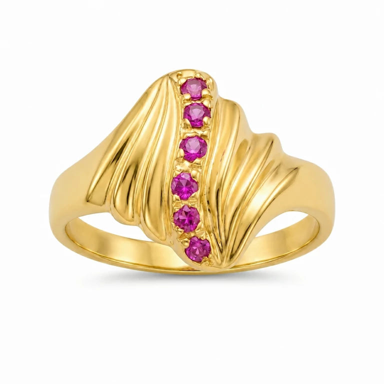 Gold ring with pink gemstones on a white background